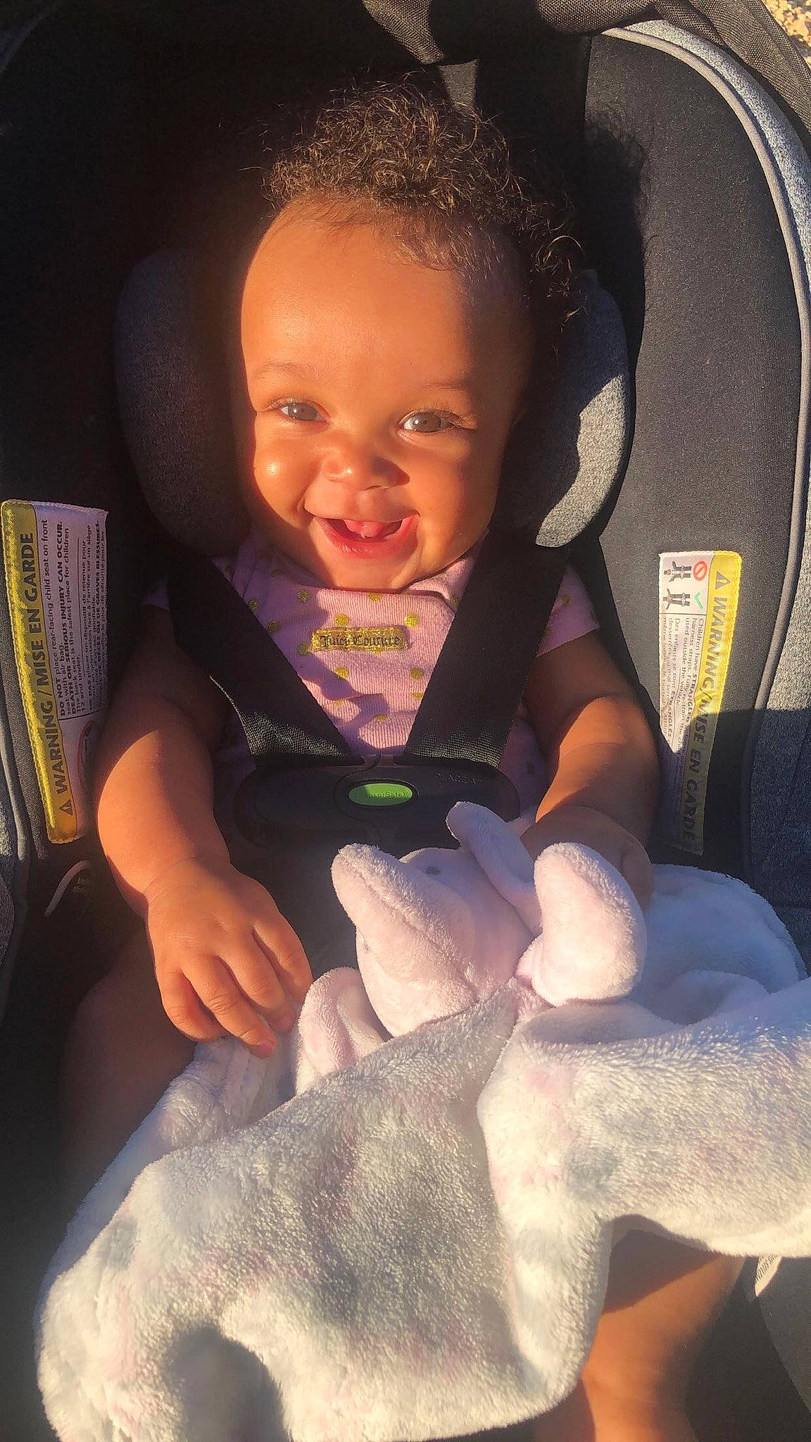 Isis Blue is registered to the contest to win money with this photo: baby, baby_toddler_clothing, black, cheek, child, comfort, cool, eye, finger, gesture, hairstyle, iris, lip, mouth, nail, nose, person, skin, smile, thumb