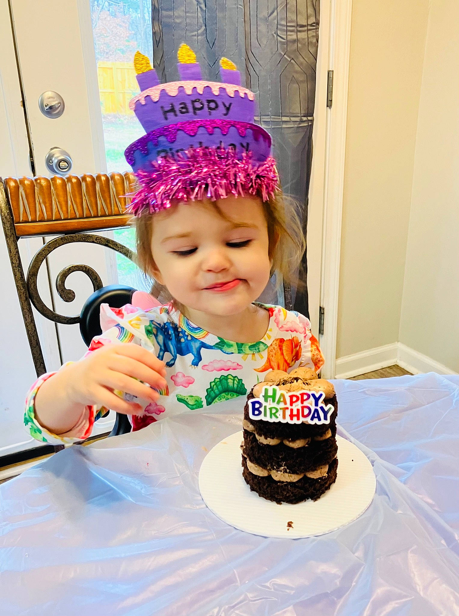 Madelynn is registered to the contest to win money with this photo: baked_goods, birthday, birthday_cake, cake, cake_decorating, cake_decorating_supply, cuisine, event, food, fun, happy, hat, headwear, joy, party_supply, person, pink, plate, smile, sugar_cake