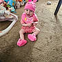 Raelynn joined the competition — help win amazing prizes! baby, child, pink, hat, carpet, toy, stuffed_animal, smile, indoor, footwear, clothing, sitting, floor, headwear, playtime, cute, happy, person, infant, room