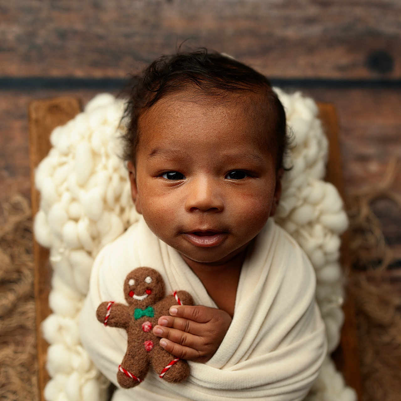 Navarro is registered to the contest to win money with this photo: accessories, applique, archaeology, baby, blanket, bodypart, bread, cake, chocolate, clothing, cookie, cream, cupcake, dessert, dress, eating, face, finger, food, gingerbread