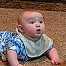 Dayton is registered to the contest to win money with this photo: baby, infant, child, blue_clothing, bib, carpet, crawling, face, expression, hands, indoor, person, skin, texture, young_child, cute, portrait, wide_eyes, surprised, casual