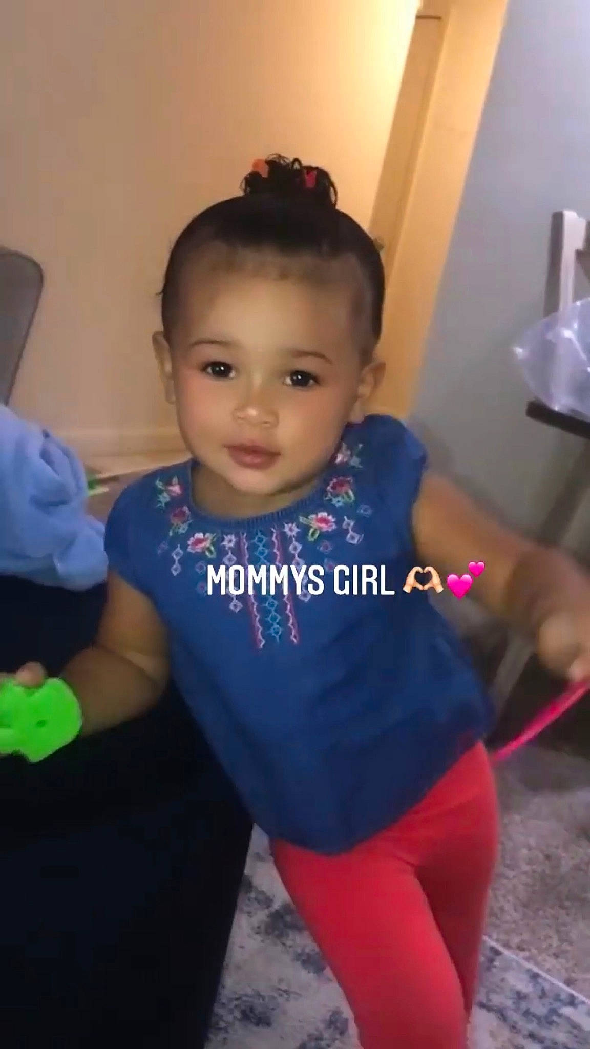 Cae is registered to the contest to win money with this photo: arm, baby_toddler_clothing, child, chin, cool, electric_blue, flooring, fun, hairstyle, happy, head, joint, neck, person, shoulder, sleeve, standing, t_shirt, thigh, toddler