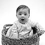 Jesse joined the competition — help win amazing prizes! baby, basket, black_and_white, blanket, child, cute, expression, face, infant, indoors, monochrome, person, portrait, sitting, surprised, woven, young, head, clothing, studio