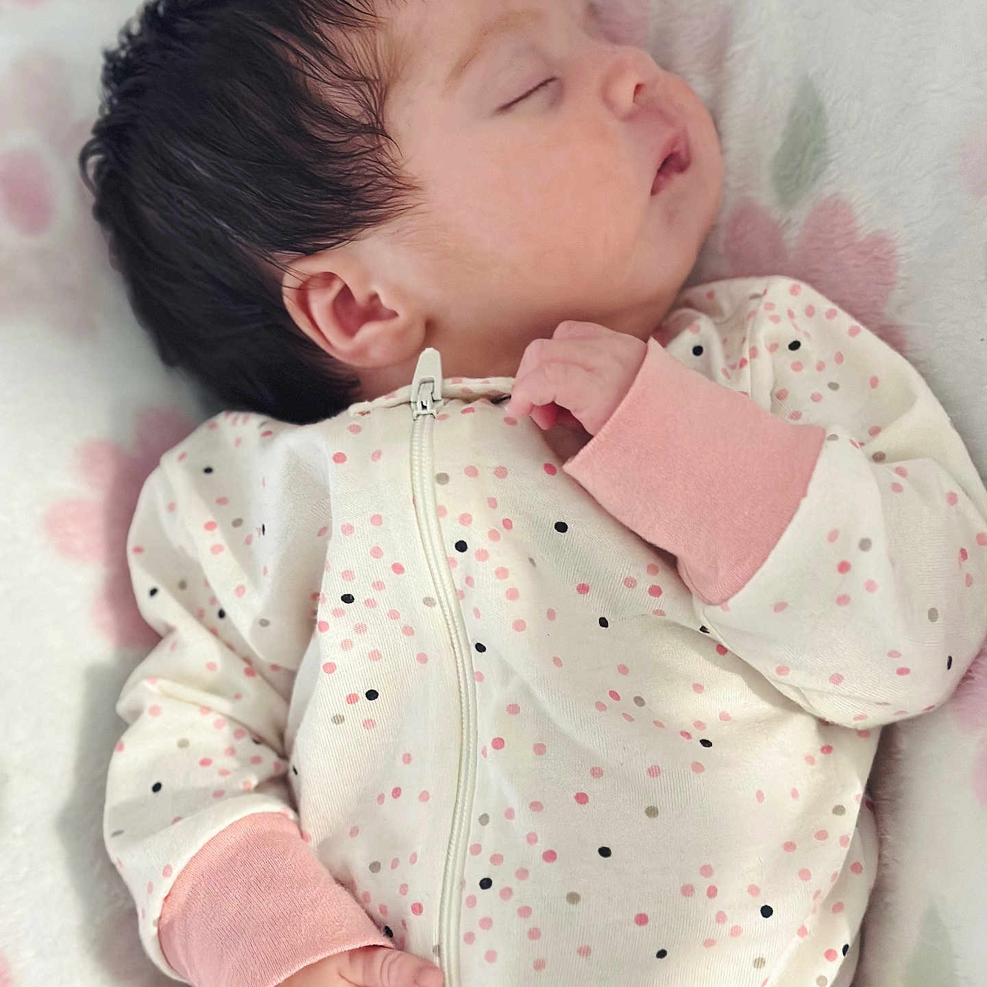 Kailey is registered to the contest to win money with this photo: baby, blanket, bodypart, clothing, coat, face, finger, furniture, hand, head, jacket, newborn, pajamas, person, photography, portrait, sleeping, sleeve, yawning