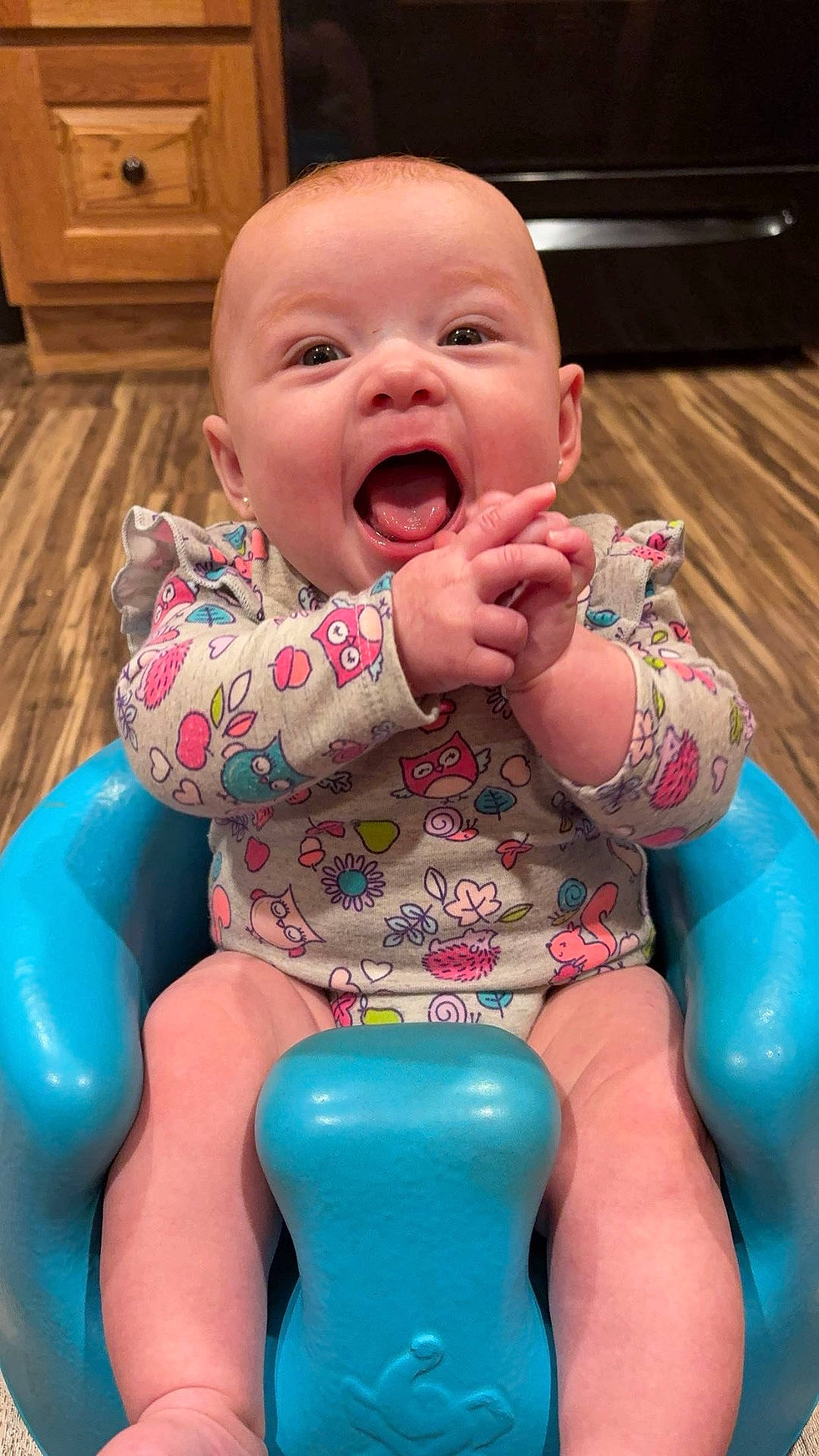 Emberly is registered to the contest to win money with this photo: accessories, baby, babylaughing, cabinet, chair, face, furniture, happy, head, indoors, jewelry, laughing, necklace, newborn, person, photography, plant, portrait, pottedplant, sitting
