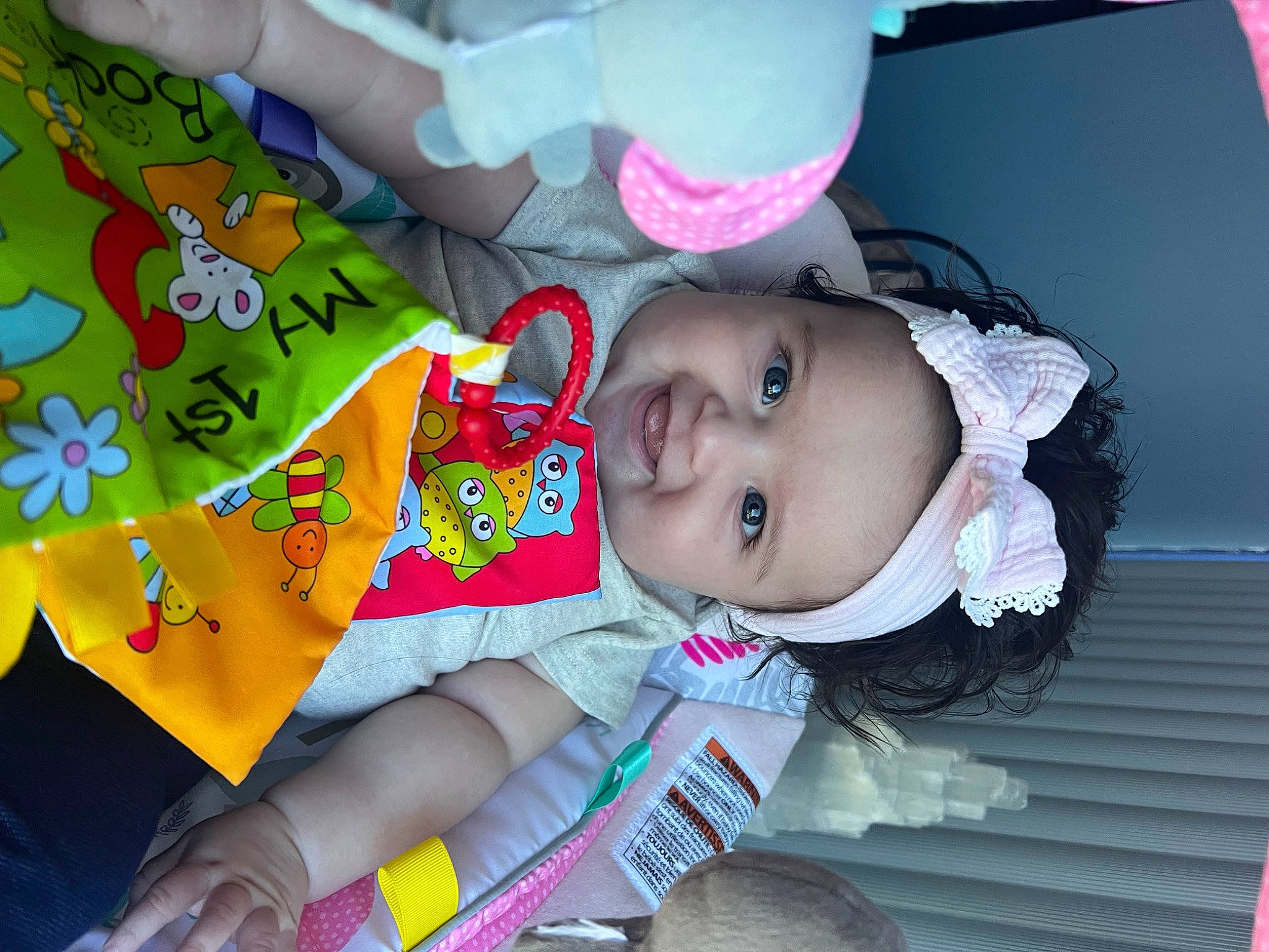 Alice is registered to the contest to win money with this photo: baby, baby_products, baby_toddler_clothing, carmine, cheek, child, event, fun, happy, headwear, magenta, pattern, person, pink, play, room, sleeve, smile, toddler, toy