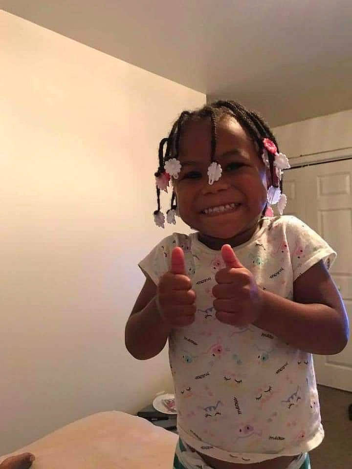 Skylar is registered to the contest to win money with this photo: art, audio_equipment, child, event, eyewear, fun, gesture, happy, joy, magenta, person, personal_protective_equipment, room, smile, t_shirt, toddler, vision_care, visual_arts