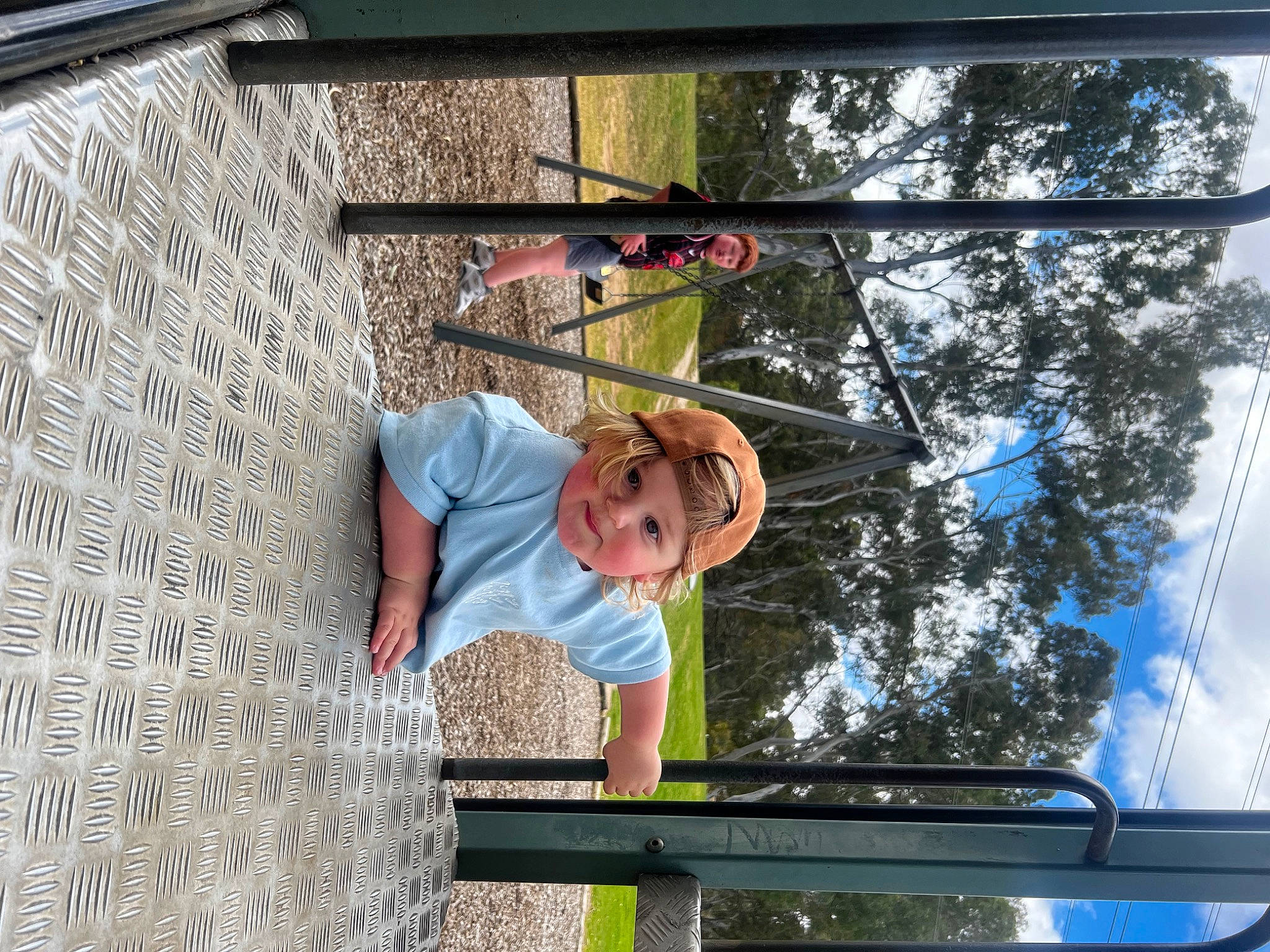 Lincoln joined the competition — help win amazing prizes! adventure, cloud, concrete, facade, fun, hat, headwear, helmet, leisure, person, recreation, rope, shorts, sky, sunglasses, t_shirt, toddler, tree, window