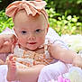 Rhylee joined the competition — help win amazing prizes! baby, child, headband, pink, flower, flower_bed, outdoor, greenery, cute, smiling, infant, summer, dress, skin, foot, hand, portrait, nature, soft, relaxed
