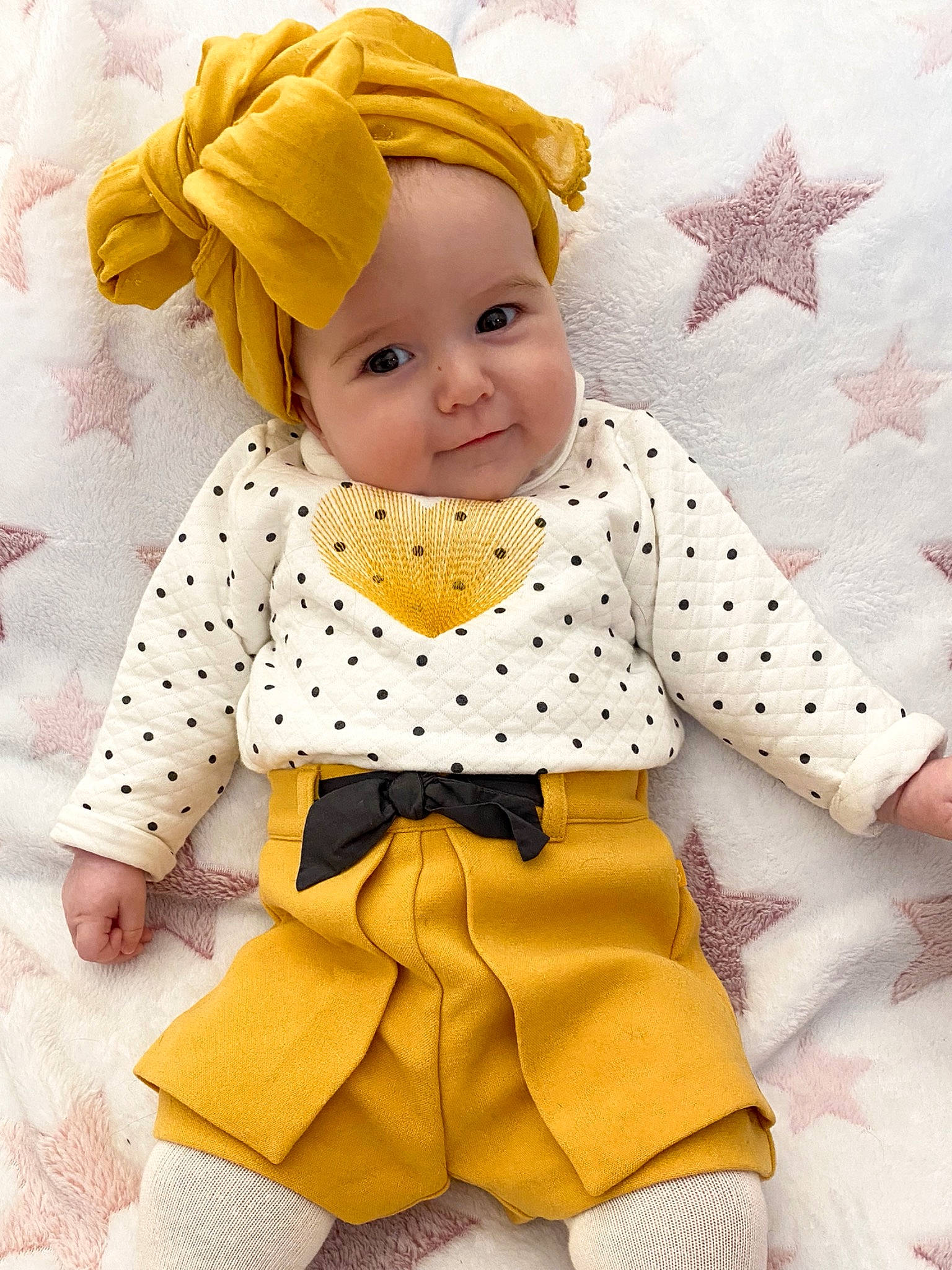 Lyana a rejoint le concours — aidez-le/la à gagner de superbes lots ! baby, baby_products, baby_toddler_clothing, child, doll, dress_shirt, happy, headwear, linens, outerwear, pattern, person, pink, product, sleeve, textile, toddler, toy, vintage_clothing, waist