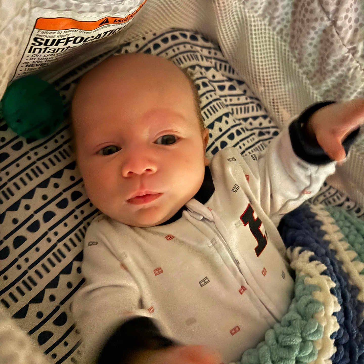 Bekett is registered to the contest to win money with this photo: baby, bed, blanket, bodypart, clothing, crib, cushion, face, finger, furniture, hand, head, homedecor, infantbed, knitwear, newborn, person, photography, portrait, sweater