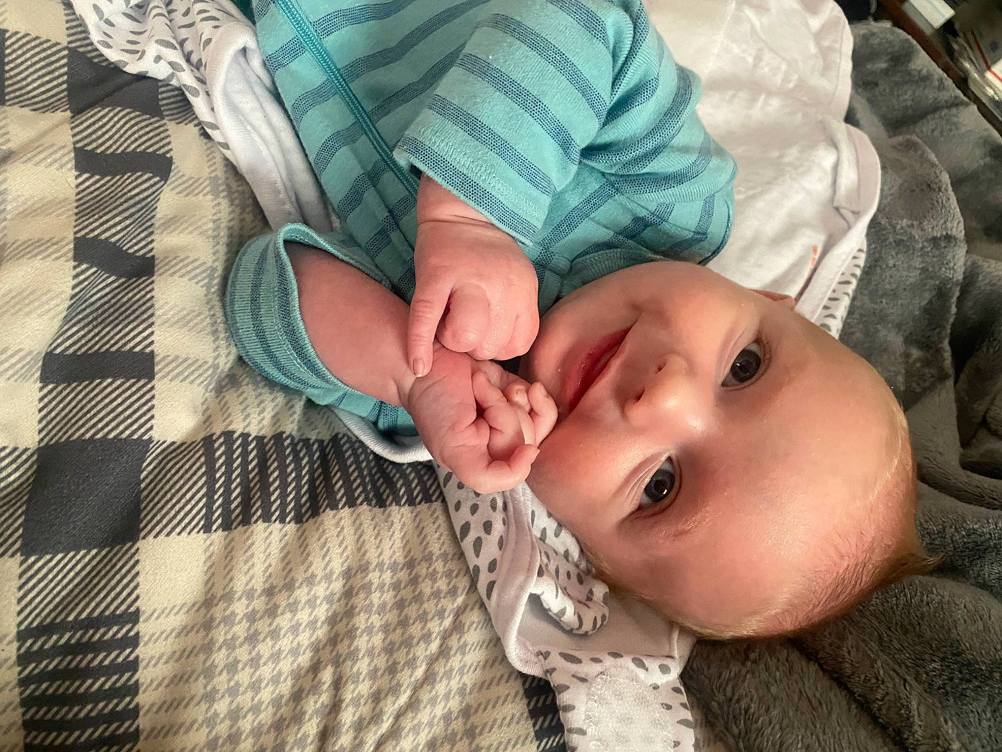 Kaysen is registered to the contest to win money with this photo: baby, baby_toddler_clothing, cheek, comfort, eye, eyelash, face, happy, hat, head, human_body, iris, lip, mouth, nose, pattern, person, skin, sleeve, smile