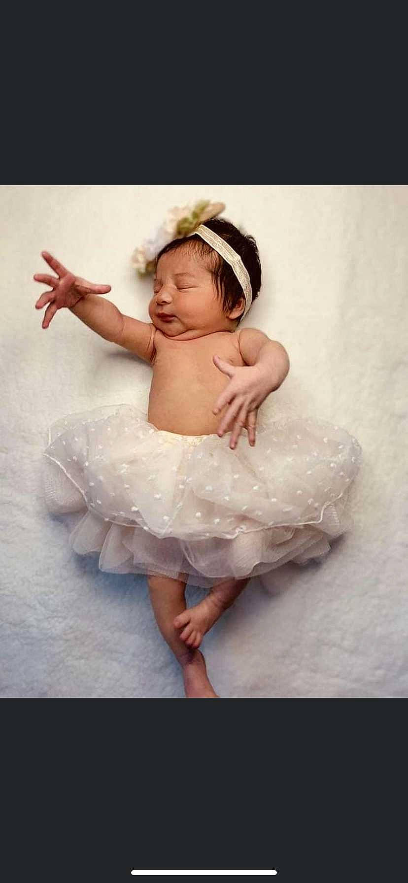 Mariyana joined the competition — help win amazing prizes! baby, baby_toddler_clothing, barefoot, bridal_accessory, dress, embellishment, event, fashion_accessory, flash_photography, fun, happy, headband, headpiece, human_body, human_leg, jewellery, leg, peach, person, sitting