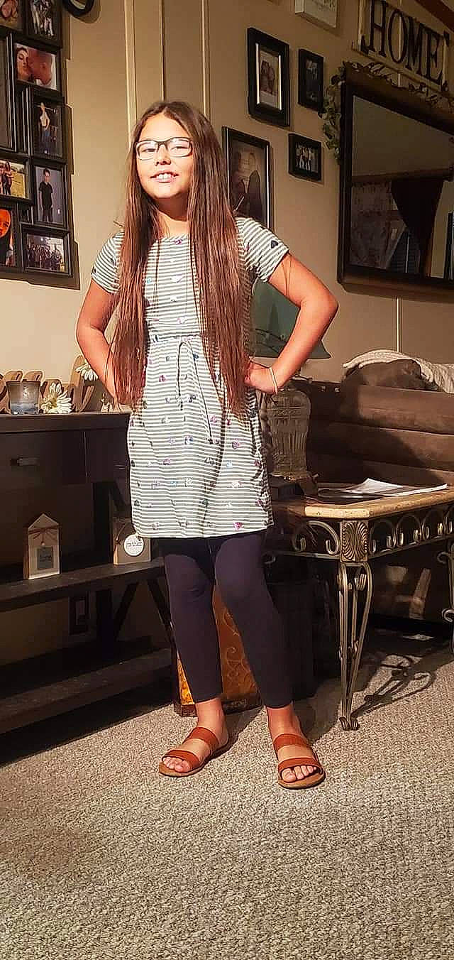 Brianna joined the competition — help win amazing prizes! black, black_hair, eyewear, fashion, fashion_design, flash_photography, hair, joy, knee, leg, long_hair, person, picture_frame, plaid, shoe, shoulder, sleeve, standing, style, thigh