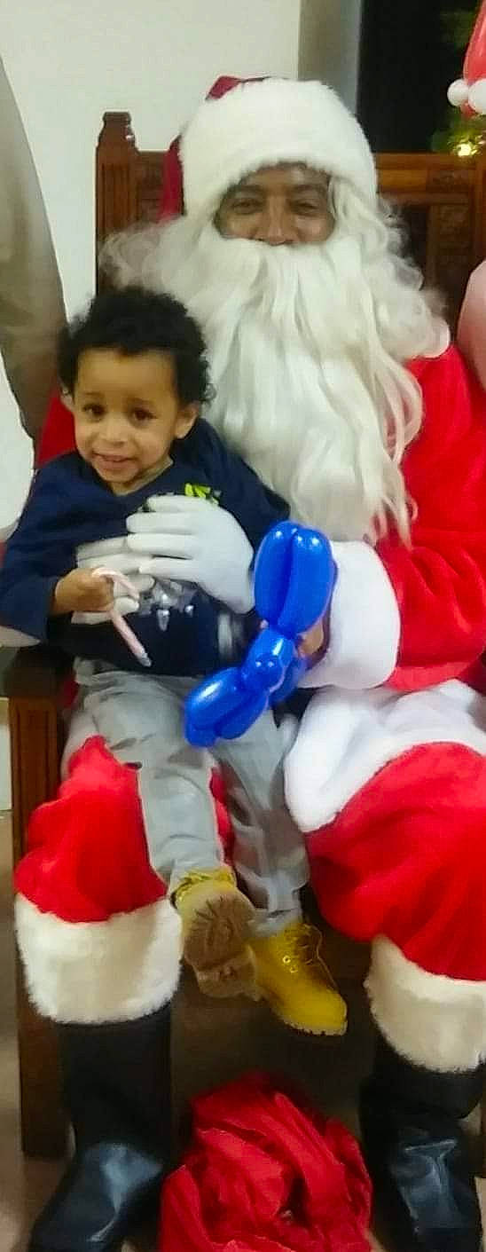 Jamere joined the competition — help win amazing prizes! arm, child, christmas, fictional_character, fun, headwear, joy, lap, leg, person, play, santa_claus, smile, textile, toddler