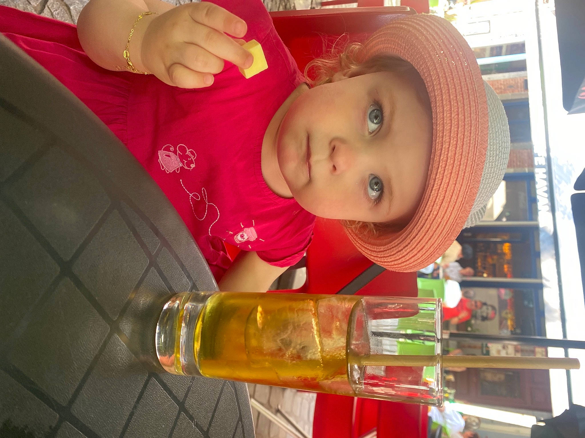 Livia-alabama participe au concours pour gagner de l'argent avec cette photo : alcohol, baby, baby_toddler_clothing, barware, beer, blurred, bottle, cap, child, distilled_beverage, drink, drinking, drinkware, fluid, fun, glass_bottle, hat, headwear, orange, person