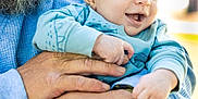 Jameson joined the competition — help win amazing prizes! baby, child, adult, beard, glasses, hands, blue_clothing, smiling, outdoor, sunlight, nature, happy, portrait, person, holding, close_up, family, human, face, infant
