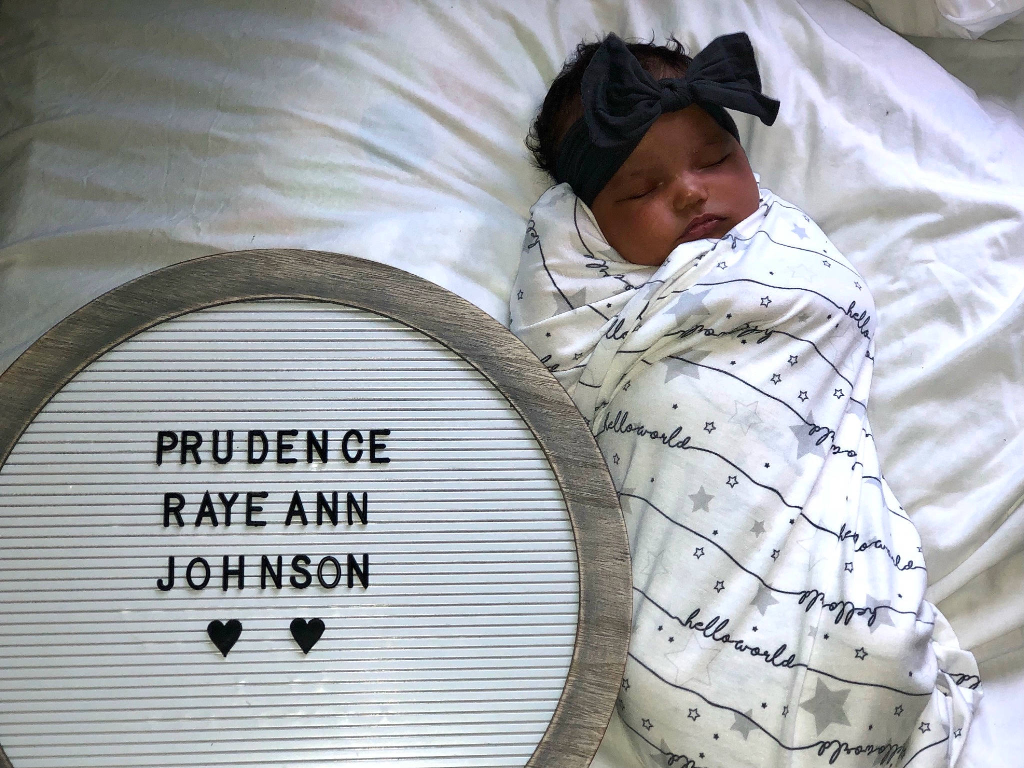 Prudence is registered to the contest to win money with this photo: bedding, bedtime, blanket, circle, comfort, font, headwear, linens, menu, musical_instrument, nap, pattern, person, room, sleep, white