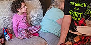 Ruby joined the competition — help win amazing prizes! adult, blanket, boy, child, christmas, clothing, curlyhair, face, female, festival, girl, hair, head, male, openingpresent, pajamas, people, person, photoframe, woman