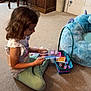 Ruby is registered to the contest to win money with this photo: architecture, building, child, computer, couch, electronics, face, female, food, furniture, girl, head, indoors, livingroom, person, photography, portrait, room, sweets, table