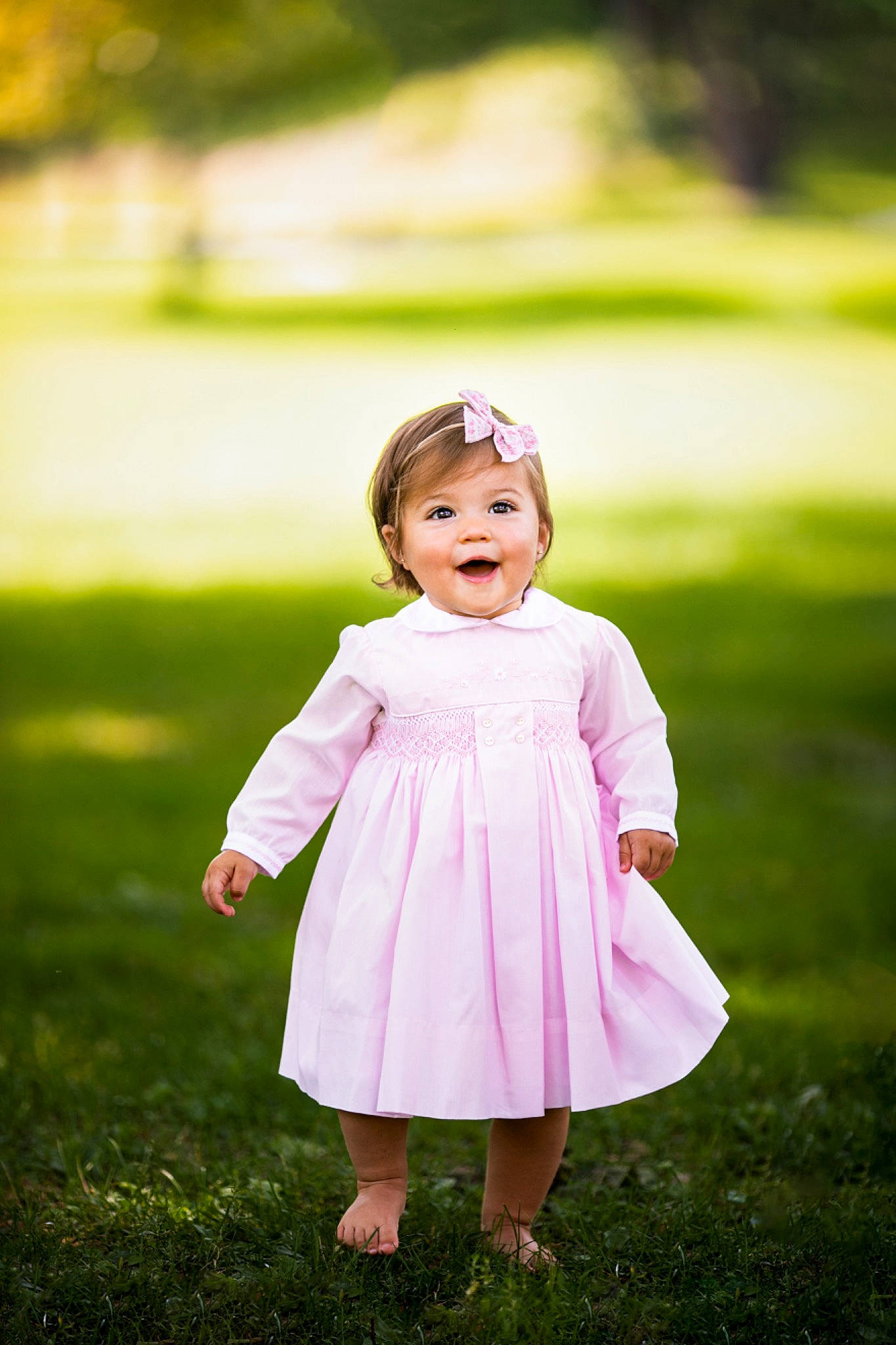 Callie joined the competition — help win amazing prizes! baby_toddler_clothing, child, day_dress, dress, flash_photography, fun, gesture, grass, grassland, happy, leisure, magenta, meadow, one_piece_garment, people_in_nature, person, pink, plant, recreation, toddler