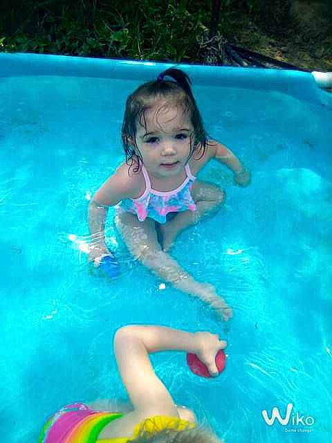 Grace joined the competition — help win amazing prizes! aqua, bathing, beauty, blue, child, electric_blue, fluid, fun, green, happy, leisure, nonbuilding_structure, one_piece_swimsuit, person, recreation, summer, swimming_pool, swimwear, thigh, toddler