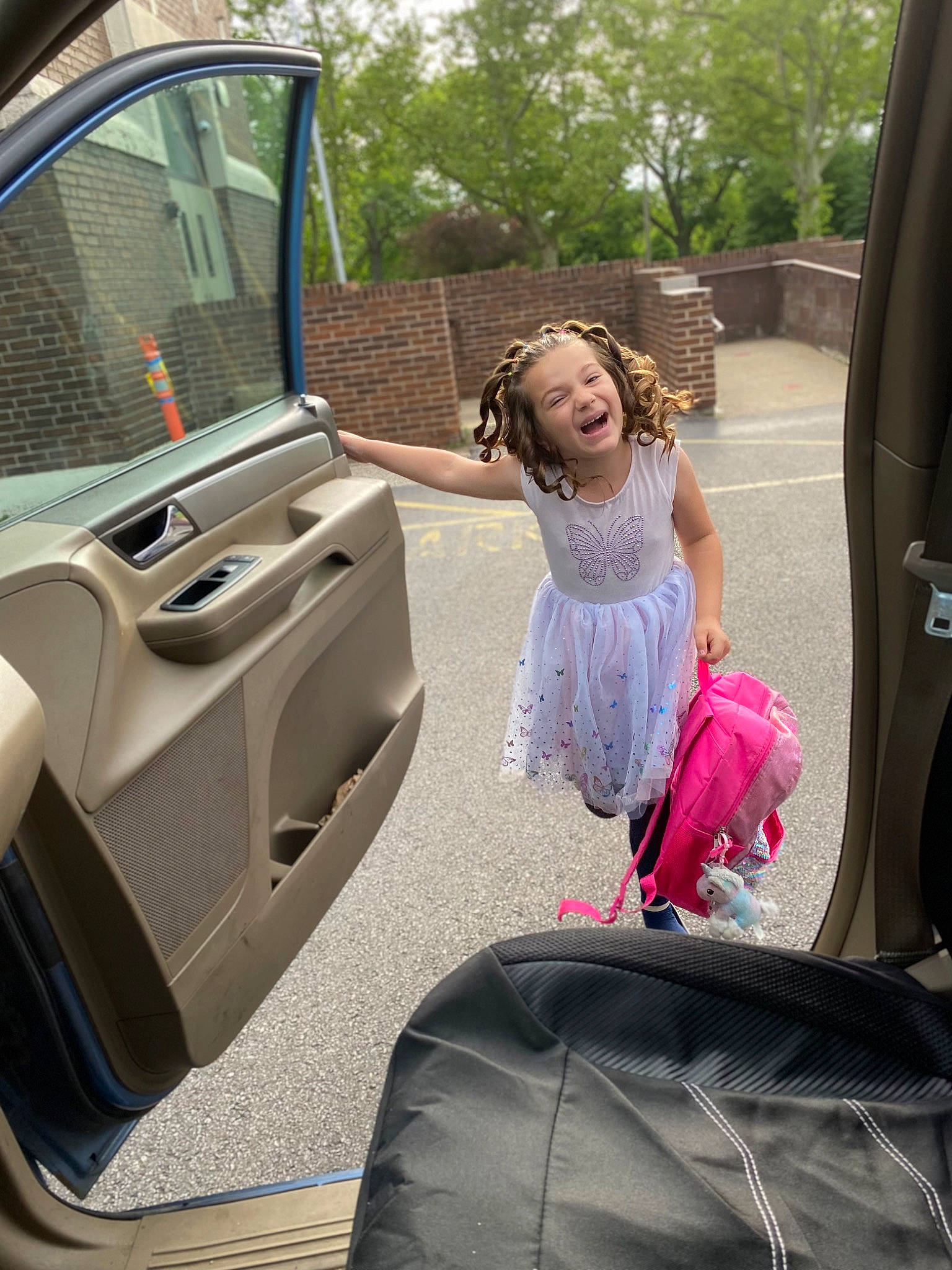 Maddison is registered to the contest to win money with this photo: auto_part, automotive_design, automotive_exterior, automotive_lighting, automotive_tire, automotive_window_part, bumper, car, fun, leisure, mode_of_transport, motor_vehicle, person, personal_luxury_car, tints_and_shades, tree, trunk, vehicle, vehicle_door, window