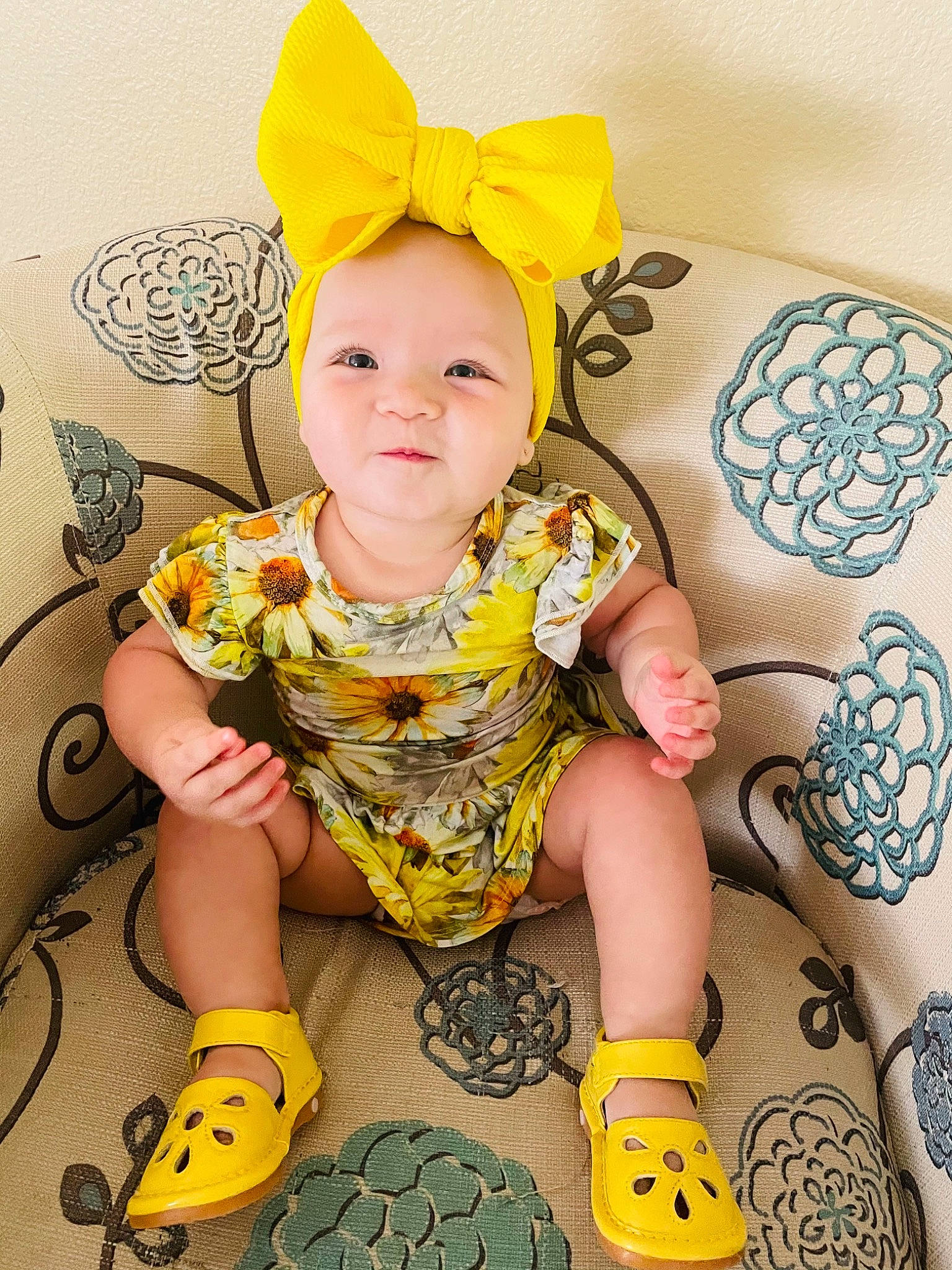Alaska joined the competition — help win amazing prizes! baby, baby_products, baby_toddler_clothing, child, comfort, facial_expression, fashion_accessory, fun, happy, human_leg, orange, pattern, person, pink, purple, sitting, sleeve, sneakers, thigh, toddler
