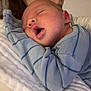 Kingston joined the competition — help win amazing prizes! baby, sleeping, blue_clothing, striped, blanket, soft_texture, closeup, infant, resting, peaceful, person, child, cozy, cute, portrait, indoors, newborn, warm, tender, comfort