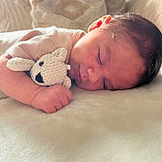 Madi participe au concours pour gagner de l'argent avec cette photo : baby, sleeping, cuddling, teddy_bear, blanket, soft_texture, cozy, pillow, indoor, natural_light, peaceful, child, infant, closeup, resting, cute, portrait, homedecor, hand, face