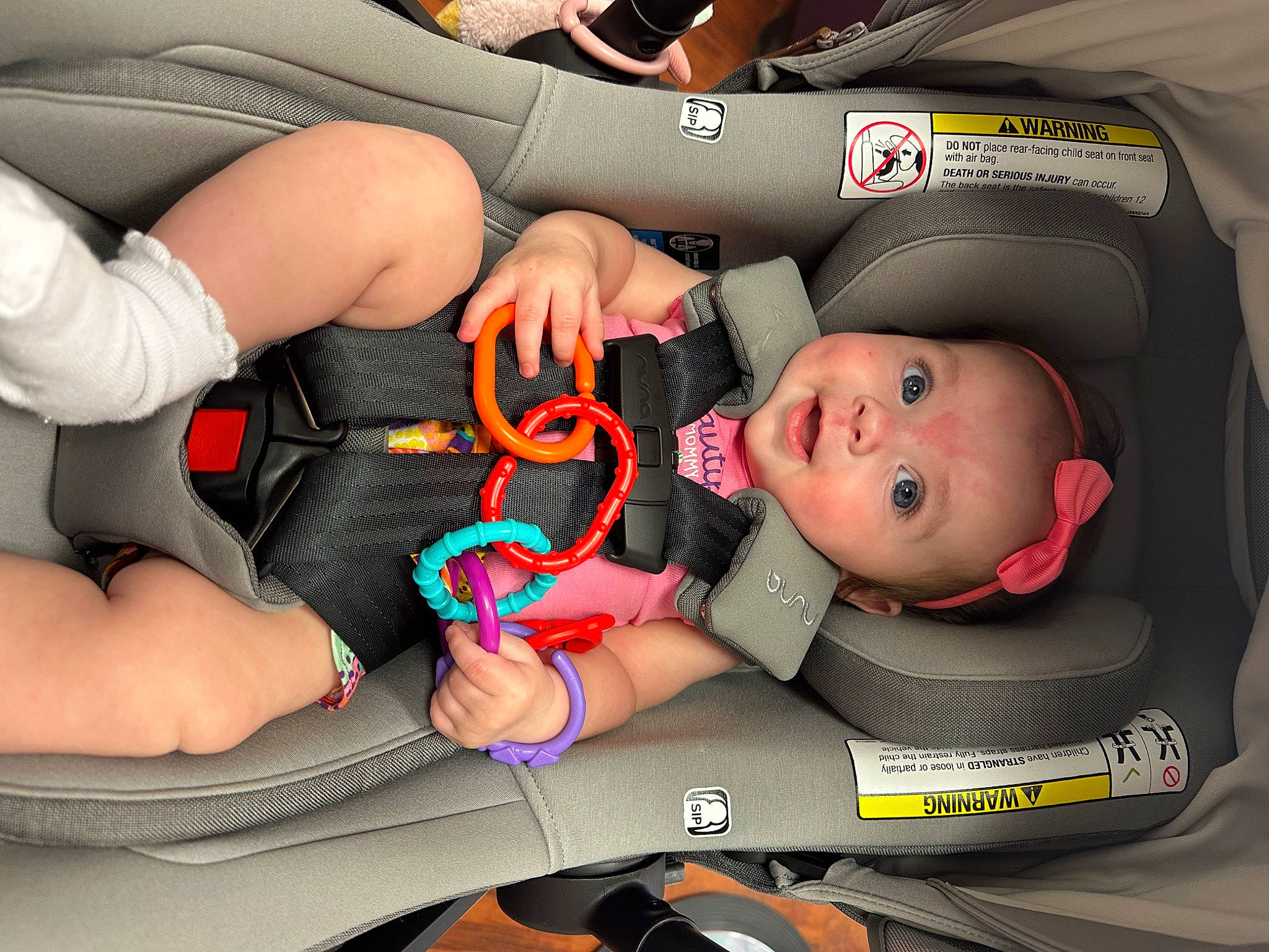 Allison is registered to the contest to win money with this photo: auto_part, baby, baby_carriage, baby_in_car_seat, baby_products, car_seat, carmine, child, comfort, finger, headwear, health_care, human_leg, knee, nail, person, product, service, thigh, thumb