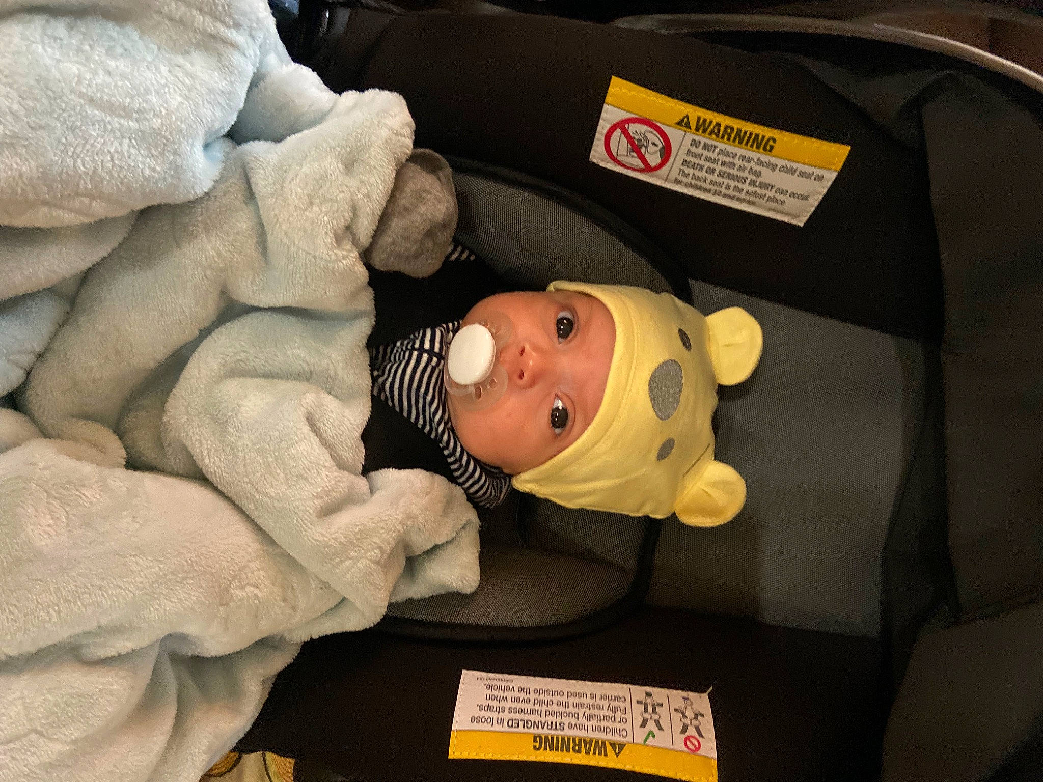 Damian is registered to the contest to win money with this photo: baby, baby_carriage, baby_products, baby_safety, baby_sleeping, baby_toddler_clothing, baby_toys, child, comfort, head, headgear, headwear, linens, person, room, toddler, toy