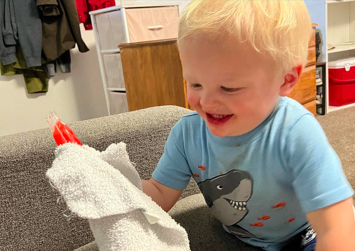 Nikolai joined the competition — help win amazing prizes! baby, baby_toddler_clothing, child, comfort, couch, eye, flooring, happy, head, joy, lap, mammal, pattern, person, red, room, sitting, smile, t_shirt, toddler