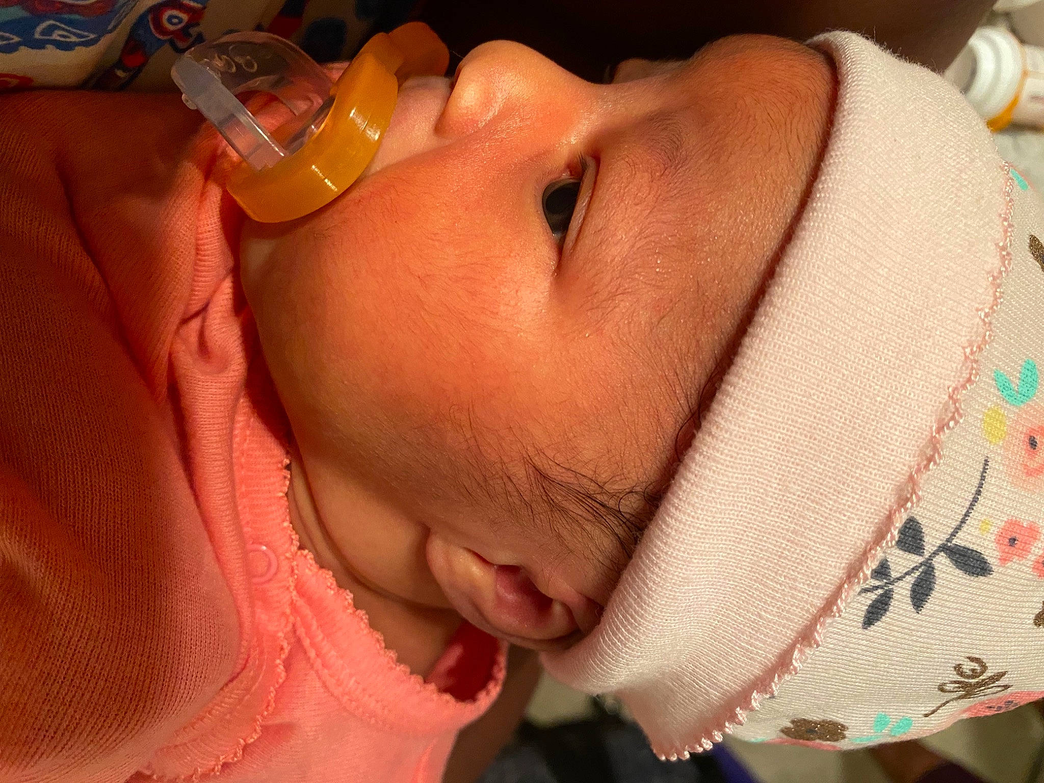 Krislynn joined the competition — help win amazing prizes! baby, baby_bottle, cheek, chin, drinkware, ear, eye, eyebrow, eyelash, finger, forehead, hand, headwear, lip, mouth, neck, nose, orange, organ, person