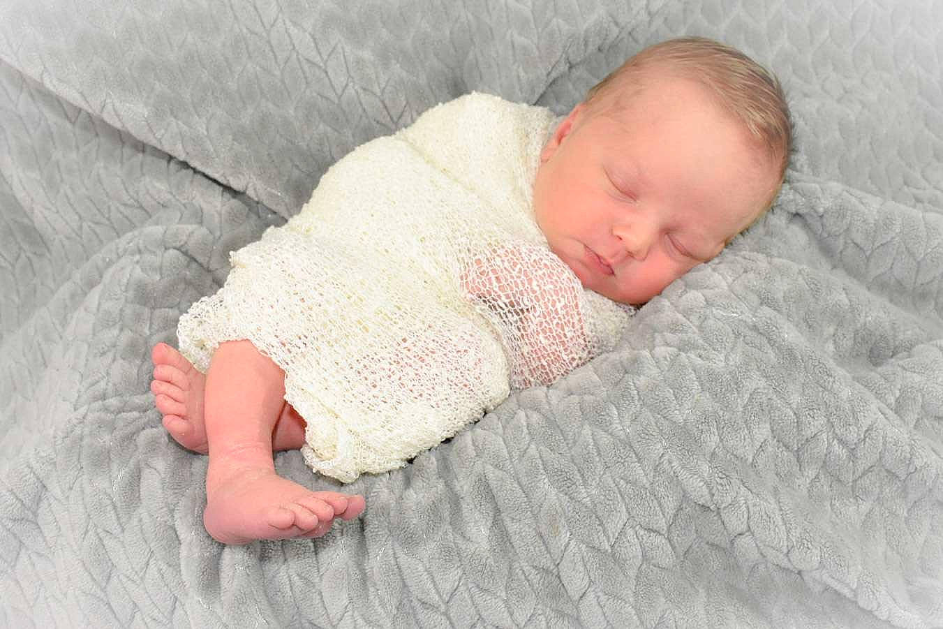 Ryder joined the competition — help win amazing prizes! baby, baby_sleeping, baby_toddler_clothing, bedding, bedtime, child, comfort, flooring, foot, linens, nap, pattern, person, skin, sleep, sleeve, textile, toddler, towel, wood
