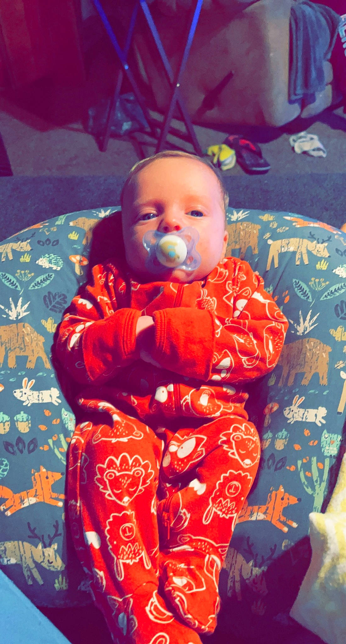 Ryder is registered to the contest to win money with this photo: baby, baby_products, baby_toddler_clothing, carmine, chair, comfort, electric_blue, event, fun, happy, iris, lip, nose, orange, pattern, person, personal_protective_equipment, sitting, sleeve, textile