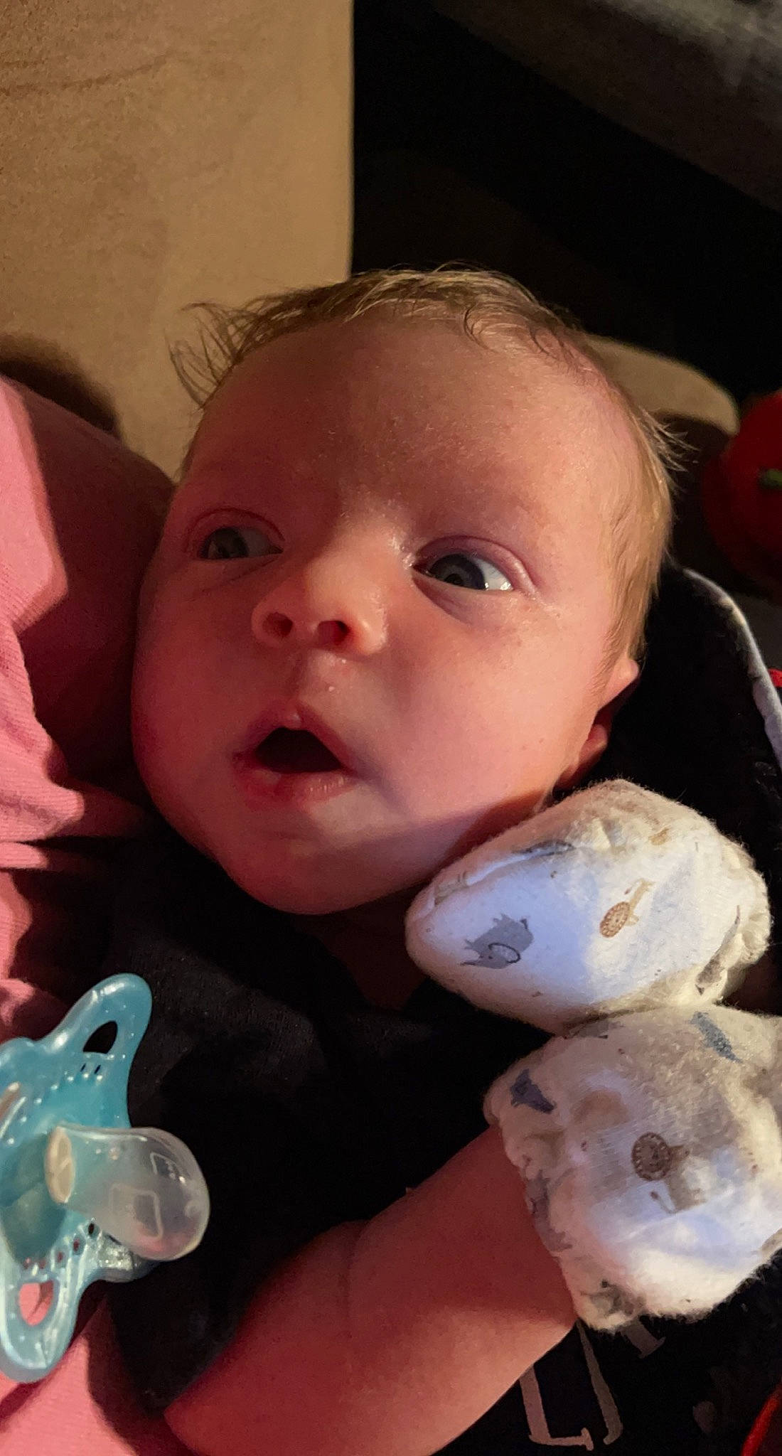 Ryder is registered to the contest to win money with this photo: baby, baby_toddler_clothing, blue, cheek, chin, ear, face, finger, happy, head, iris, lip, mouth, nose, person, pink, skin, textile, toddler, toy