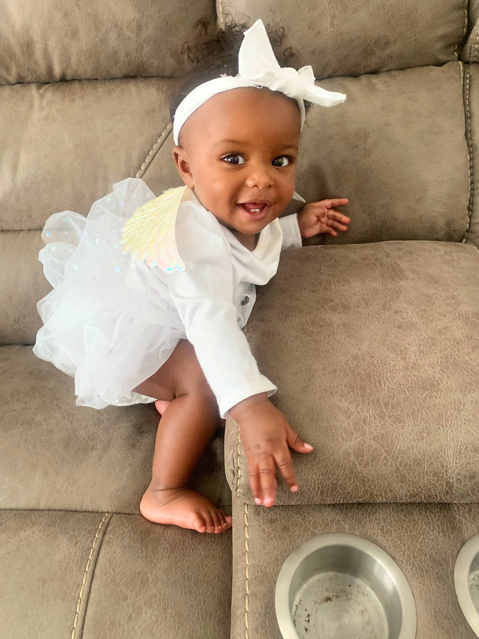 Tamara joined the competition — help win amazing prizes! automotive_wheel_system, baby, baby_toddler_clothing, child, circle, couch, fashion_accessory, flash_photography, flooring, happy, headband, headpiece, joy, pattern, person, portrait_photography, sitting, skin, sleeve, smile