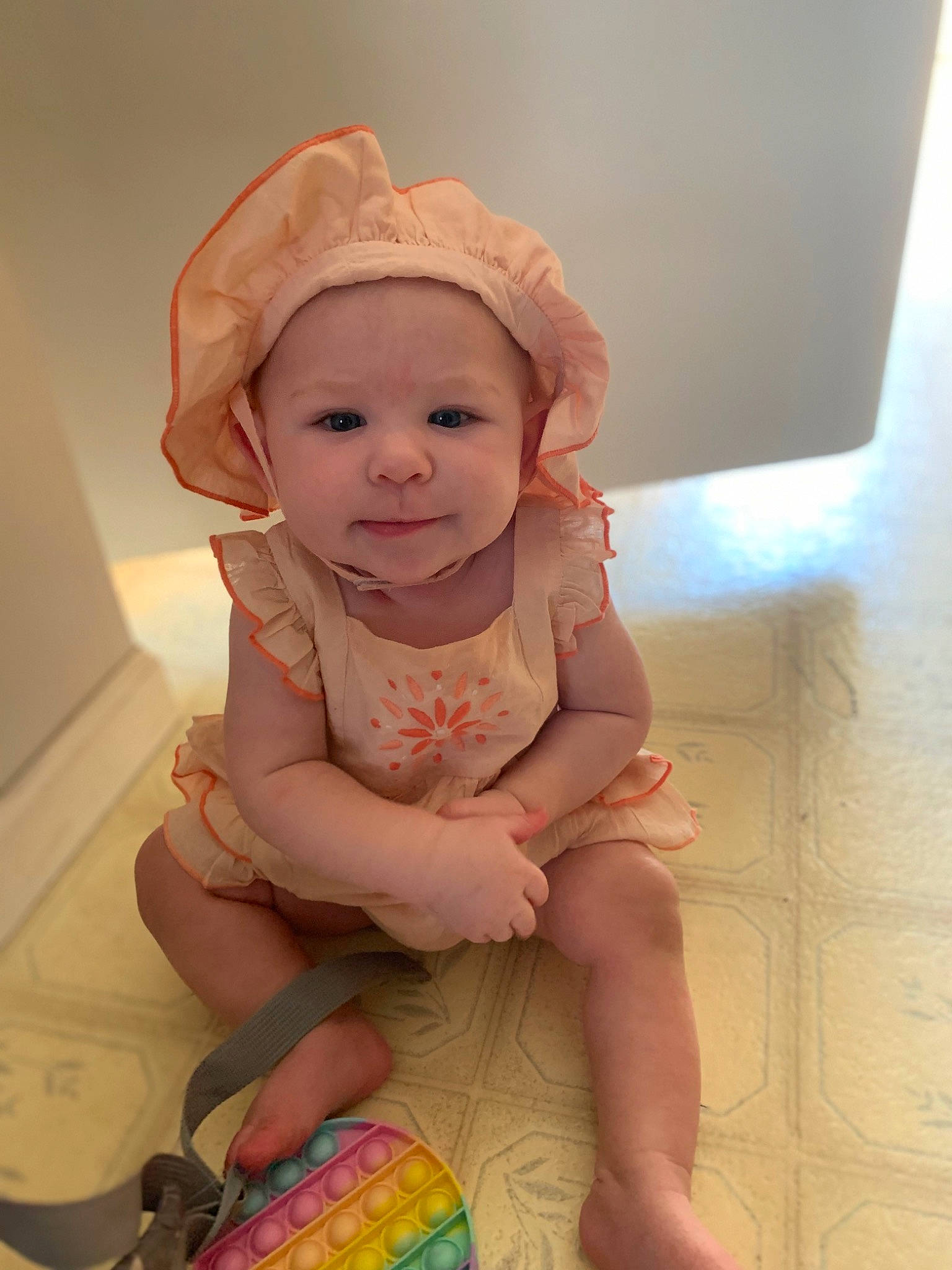 Isabell joined the competition — help win amazing prizes! baby, baby_toddler_clothing, blond, cap, cheek, child, chin, eye, flooring, fun, happy, headwear, human_leg, lip, mouth, nose, person, pink, skin, sleeve