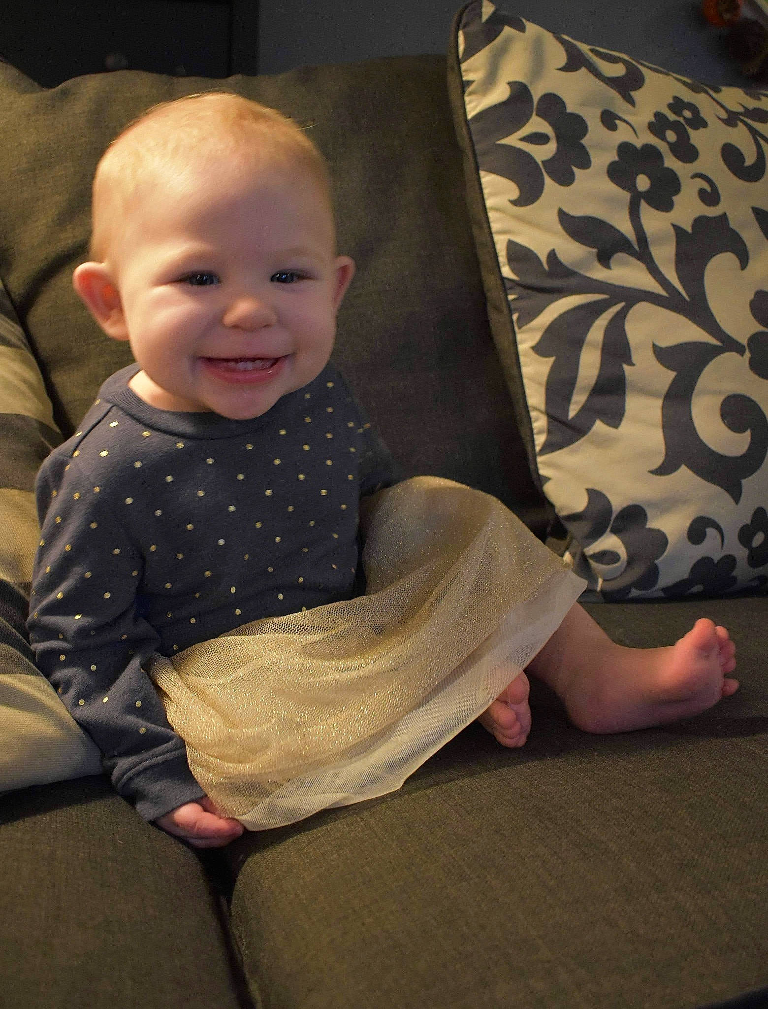 Isabell joined the competition — help win amazing prizes! baby, baby_toddler_clothing, cheek, comfort, couch, finger, floor, flooring, fun, hairstyle, human, joy, leg, mammal, person, product, skin, sleeve, smile, standing