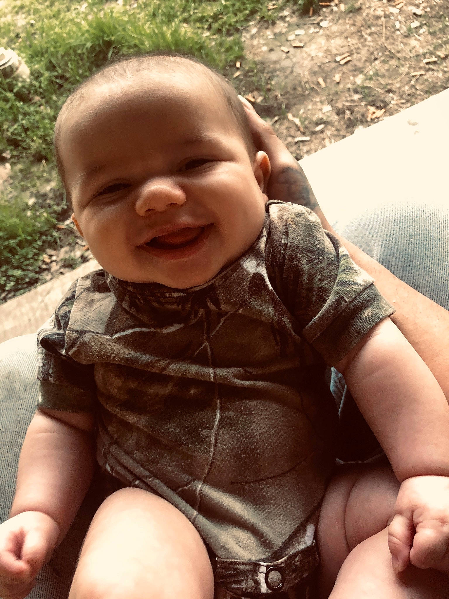 Jaxston joined the competition — help win amazing prizes! baby, child, finger, fun, grass, hand, joy, person, skin, smile, toddler