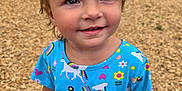 Gracelynn joined the competition — help win amazing prizes! blue_dress, butterfly, casual_clothing, child, cute, daylight, flowers, happy, outdoor, park, person, playground, playing, rainbow, short_hair, smiling, toddler, unicorn, wood_chips, young_child
