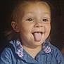 Gracelynn is registered to the contest to win money with this photo: child, toddler, face, tongue, smile, blue_shirt, plaid_collar, happy, playful, portrait, person, cute, young_child, indoor, expression, human, skin, head, cheeky, joyful