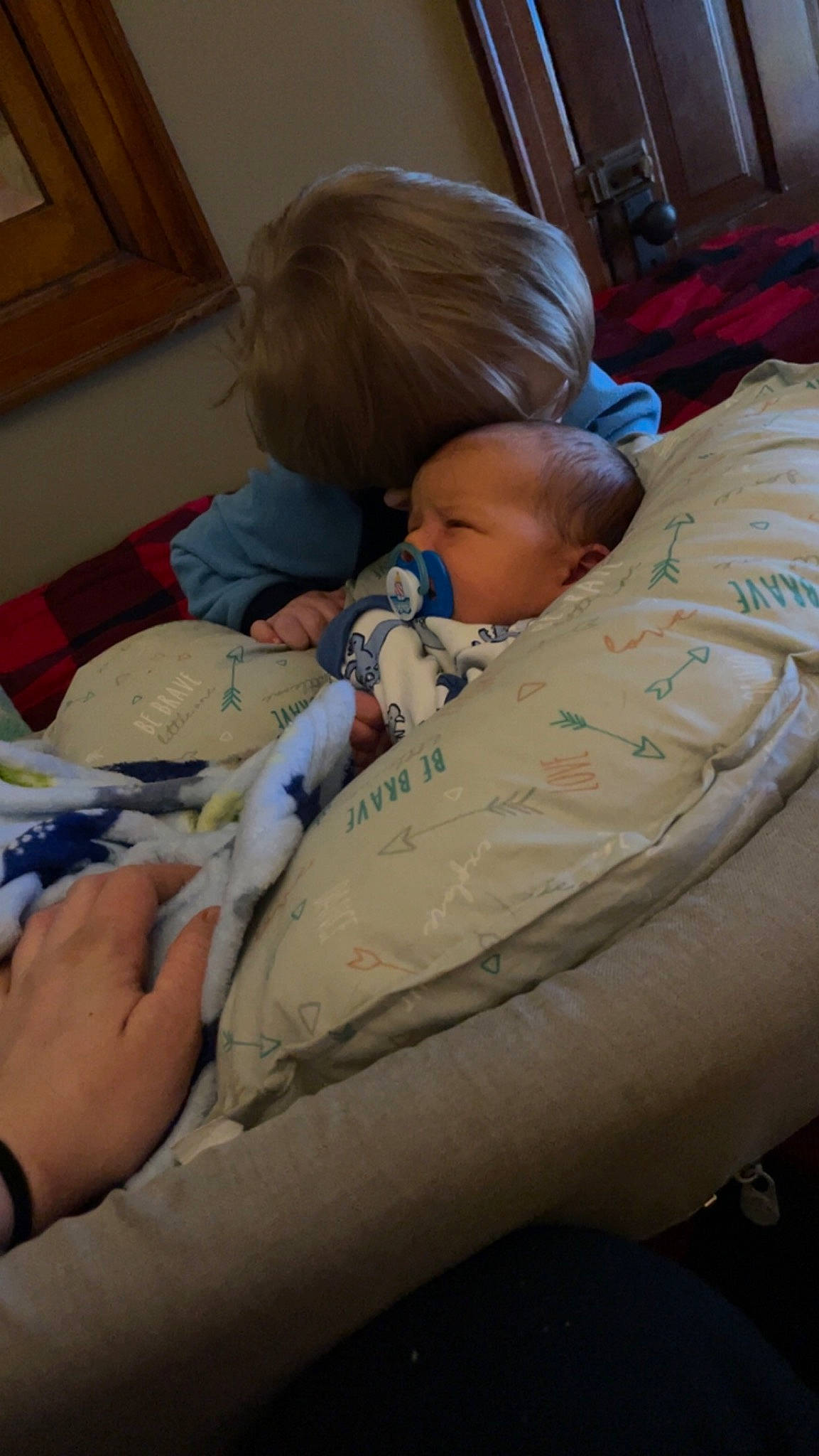 Ryder joined the competition — help win amazing prizes! baby, baby_safety, baby_sleeping, bedding, bedtime, cabinetry, child, comfort, drawer, flooring, human_leg, knee, linens, nap, person, pillow, room, sitting, toddler, watch