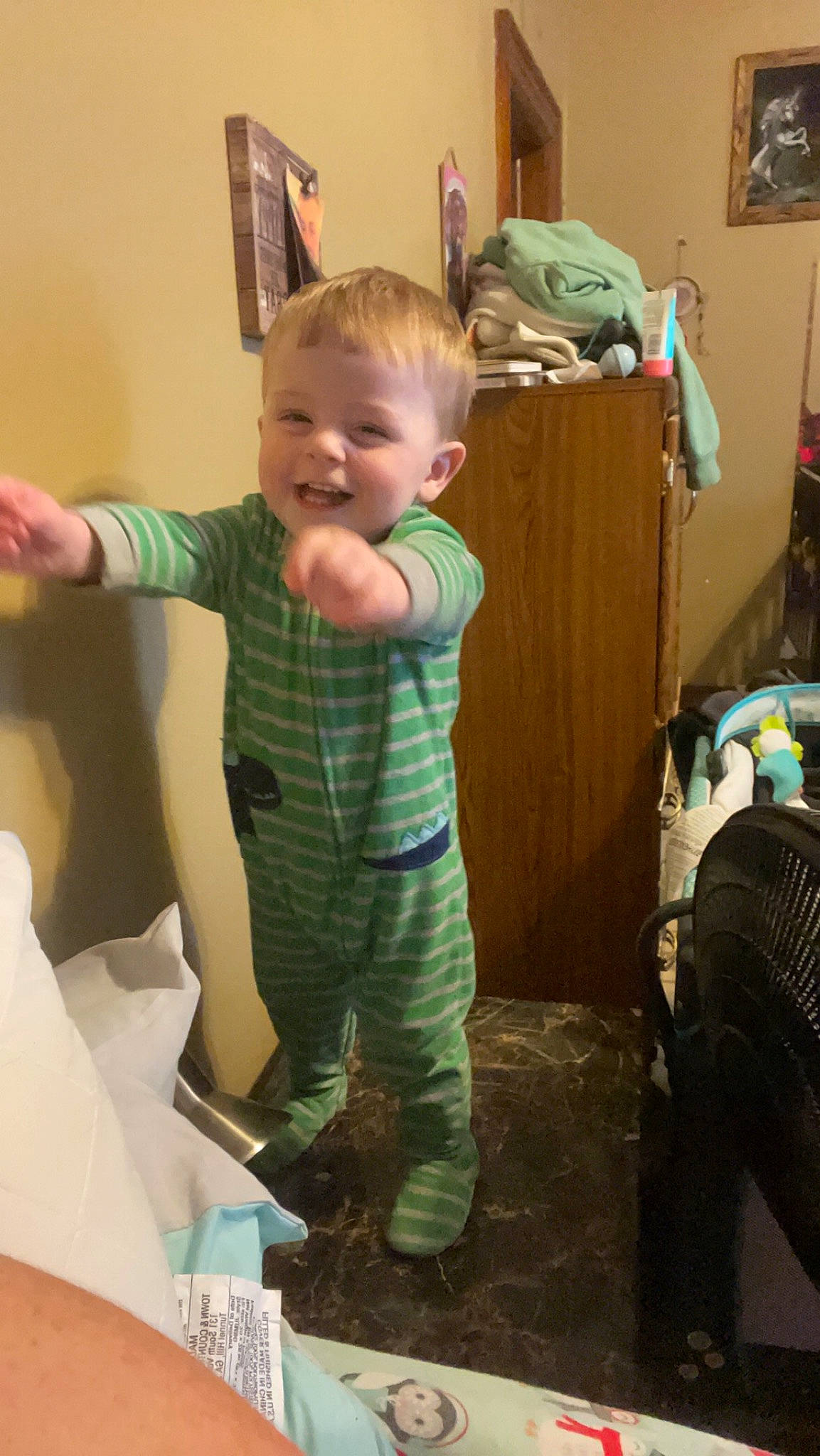 Ryder is registered to the contest to win money with this photo: baby, baby_toddler_clothing, child, event, flooring, fun, holiday, joint, joy, leg, person, picture_frame, play, product, sleeve, smile, standing, t_shirt, textile, thumb