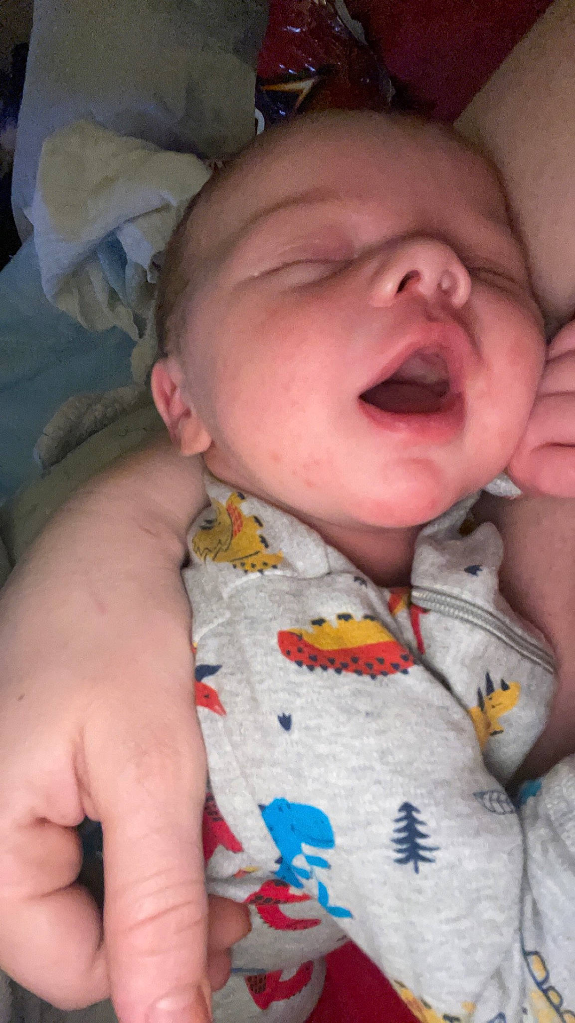 Keegan is registered to the contest to win money with this photo: arm, baby, baby_toddler_clothing, cheek, chin, comfort, face, facial_expression, finger, forehead, gesture, head, lip, mouth, muscle, neck, nose, person, skin, sleeve