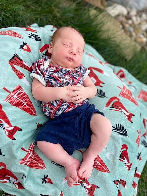 Owen joined the competition — help win amazing prizes! baby, baby_toddler_clothing, carmine, child, comfort, event, fun, grass, happy, lap, pattern, people_in_nature, person, pink, plaid, plant, sitting, skin, sleeve, textile