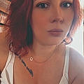 Melody B.