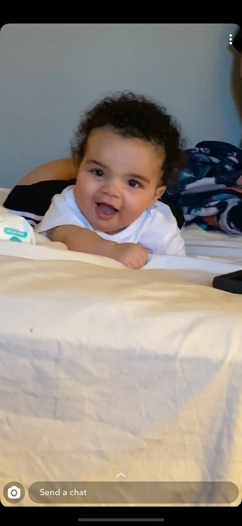 Jacari is registered to the contest to win money with this photo: baby, bed_sheet, bedding, bedtime, blanket, cheek, child, linens, person, skin, sleep, smile, textile, toddler