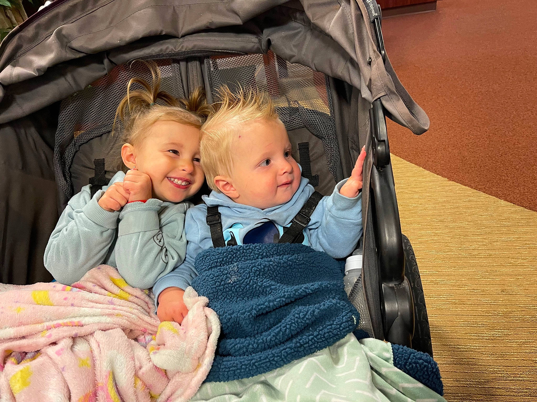 Maci is registered to the contest to win money with this photo: baby, baby_carriage, baby_products, baby_toddler_clothing, chair, cheek, child, comfort, facial_expression, fun, grass, happy, human, human_body, iris, joy, leisure, person, product, skin